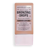 Revolution Beauty, Bright Light Bronzing Drops, Bronze & Glow Face & Body Drops Infused with Hyaluronic Acid, Bronze Scorched, 0.77 Fl. Oz.