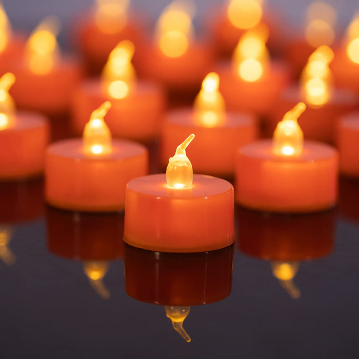 LANKER 24 Pack Orange Tea Lights Candles – Flickering Warm Yellow Lights Flameless LED Candles – Long Lasting Battery Operated Fake Candles – Decoration for Wedding, Halloween and Christmas (Orange)