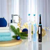 Oral-B iO Series 3 Limited Rechargeable Electric Powered Toothbrush, White with 2 Brush Heads and Travel Case - Visible Pressure Sensor to Protect Gums - 3 Modes - 2 Minute Timer